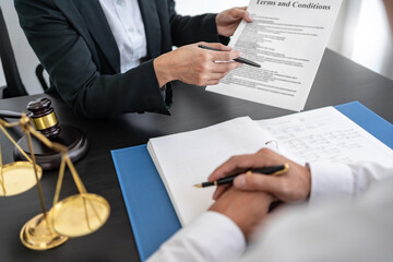 Lawyer discuss the contract and legal document agreement in office. Law and legal concept.