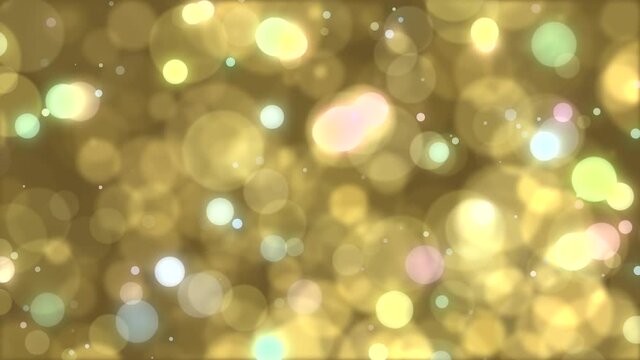 Colorful spheres in sparkling rainbow colors. Loop material with a gold background