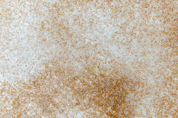 sugar texture. white and brown sugar on white surface