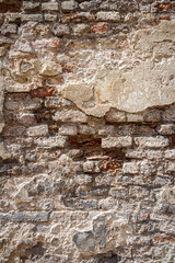Old brick and plaster wall texture background