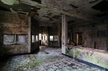 Fototapeta na wymiar Abandoned room inside old asylum