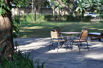 Empty Table and chairs at back yard. Set of furniture, Table and chairs for back yard garden.