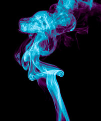 Obraz premium Purple and blue smoke isolated on black background. Abstraction