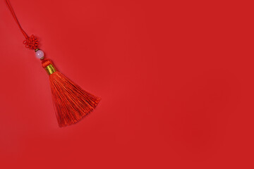minimal flat lay chinese new year decoration item on red background