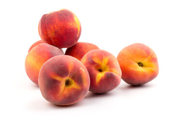 Summer fruit background. Ripe juicy peaches on white background. Copy space. Fresh organic fruit vegan food. Harvest concept