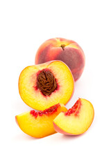 Summer fruit background. Ripe juicy peaches on white background. Copy space. Fresh organic fruit vegan food. Harvest concept