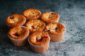 Delicious muffins with raspberries. Muffins on the table