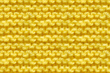 Yellow Knitwear Fabric Texture. Machine Knitting Texture Macro Snapshot. Knitted Background.