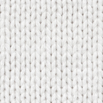 White knitted fabric seamless pattern for borderless fill. Knitted fabric repeating pattern for background close up.
