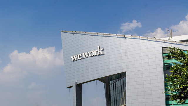 Wework logo at the roof of the new Wework office in Gurgaon