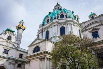 Fototapeta na wymiar Side view of Church of St Charles Borromeo - famous Karlskirche in Vienna city, Austria
