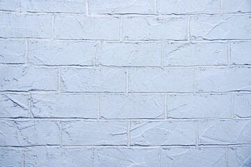 Texture background gray brick wall close-up.