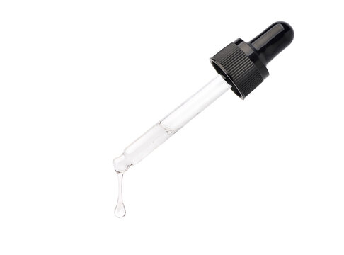 Clear essential oil dripping from dropper  isolated on white background. Clipping path.
