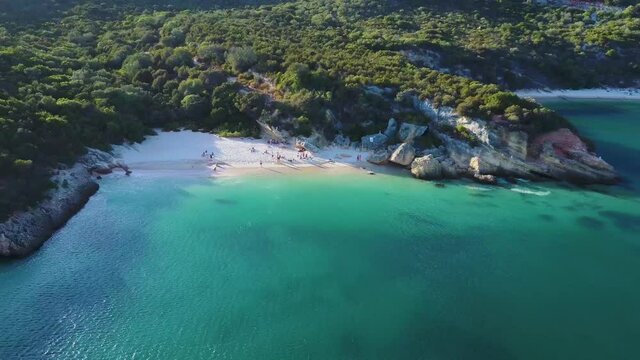 Aerial view flying over Praia dos Coelhos and the Atlantic ocean coast. Setubal, Portugal.