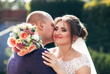 
newlyweds on a walk on a sunny day