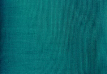 close up detail of teal green fabric texture background. interior curtain fabric texture...