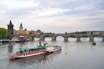 view of the Charles Bridge and St. Vitus Cathedral in Prague