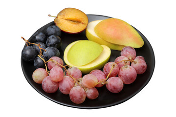 fresh fruits grape, plum, apple, pear in the plate