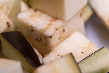 Closeup of chopped eggplant cut into cubes