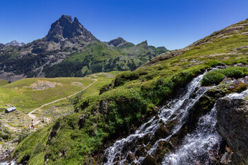 Waterfall in the lakes of Ayous near the Midi d'Ossau mountain in the Pyrenees (France)