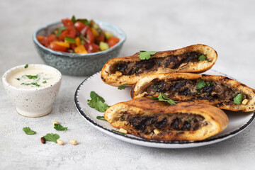 Arayes- pita bread filled with a mixture of minced meat with different spices
