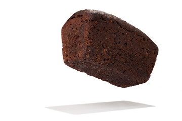Photo of the Loaf a rye bread, heroical view with shadow, isolated on the white.