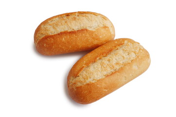 Two fresh crusty mini baguettes isolated on white bacground. Small baguette rolls. Food and breakfast background.  Worldwide hunger concept.