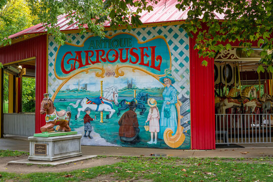 Guelph, ON, Canada - September 28, 2019: Painting in the Carousel Mural of Guelph Riverside Park, painted on the stone wall of the antique carousel found in Riverside Park, depicting horses, from 1919