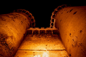 Medieval fort towers 'Torres de Quart' in the night in Valencia, Spain