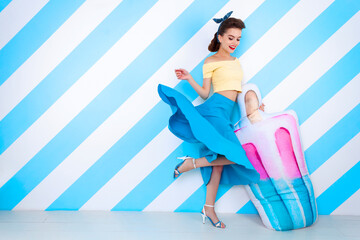 Sexy surprised woman with ice-cream in hands and open mouth. Colorful background in pop art retro comic style on striped blue background. Pinup and pop art concept