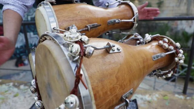 Percussionist man playing a bat&aacute; drum