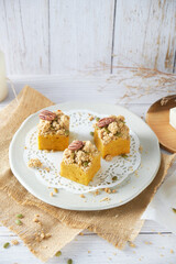 Pumpkin Cube pound cake set on cafe table.