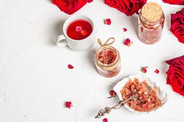 Tea time with rose petals jam and hot beverage