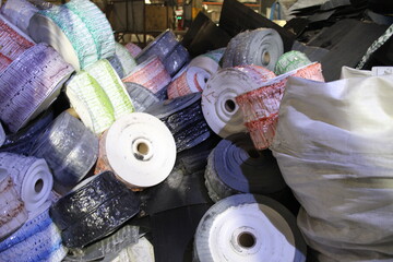 Recycling waste plastic film in rolls