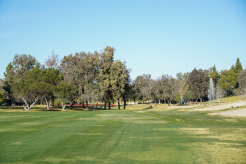 Fototapeta premium Golf Course with putting green in San Diego. Golf course with a rich green turf beautiful scenery. 