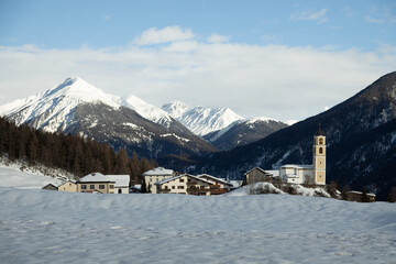 The sunny village of Brienz/Brinzauls in the canton of Graub&uuml;nden in Switzerland. The village is built in a landslide area on unstable ground and the buildings show signs of cracking and deformation. 