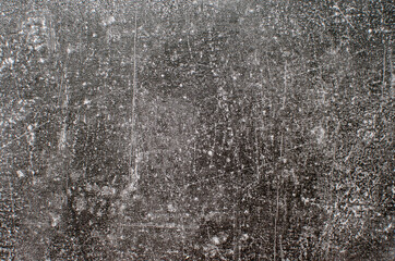 Abstract gray concrete texture background with scratches and scuffs.