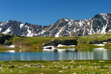 Passo Gavia, mountain pass in Lombardy, Italy, at summer. Lake