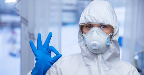 Doctor shows thumbs up. Happy doc, medic, nurse or physician. Medical professional showing positive hand gesture in hospital office and room. Good results in exams and tests.