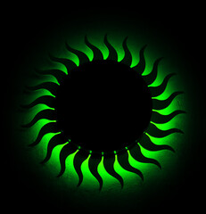 green sun with led on the wall