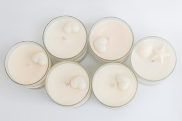 Many soy wax candles on the white background