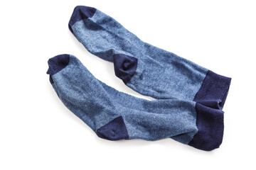 A pair of old men's sports socks isolated on a white background.