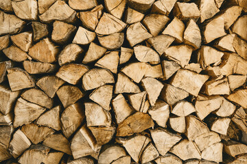 Lots of firewood or wood logs rustic background texture.