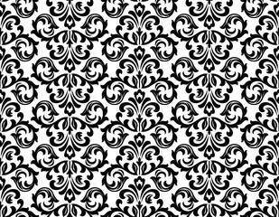 Wallpaper in the style of Baroque. Seamless vector background. White and black floral ornament. Graphic pattern for fabric, wallpaper, packaging. Ornate Damask flower ornament