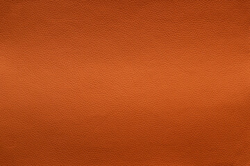 Orange leather texture with light vertical stretch, background.