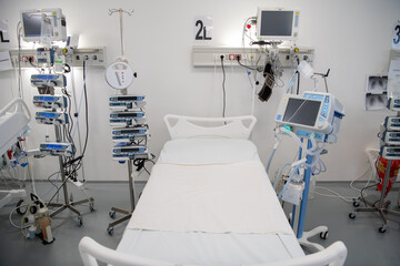 Nurse is preparing intravenous medication in intensive care unit.