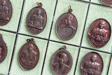 Phra Khuva Boonchum coins , Small Buddha image or Thai amulet