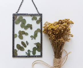 Framed pressed flowers in tiffany technique in stained glass