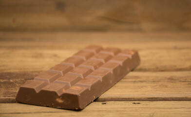 Chocolate bar with peanuts inside.
