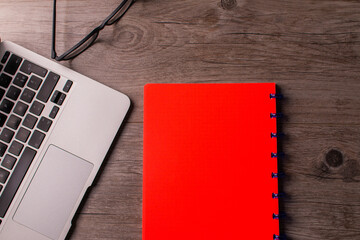 workbench with keyboard and other objects. homework concept in times of pandemic.